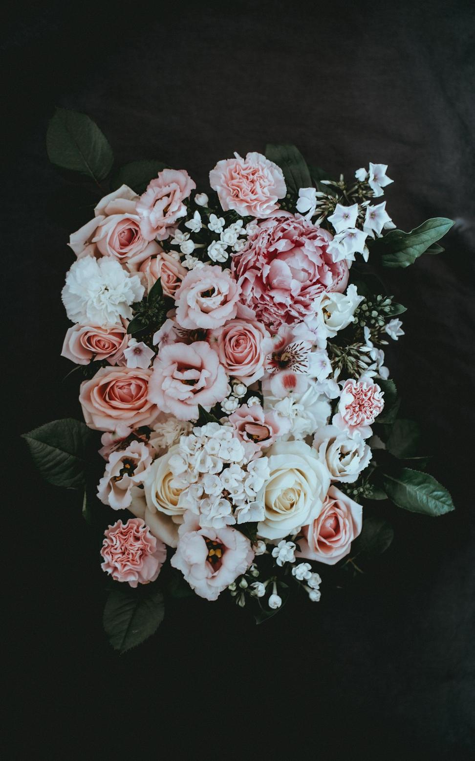 Bridal bouquet with roses and peonies